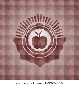 apple icon inside red seamless badge with geometric pattern.