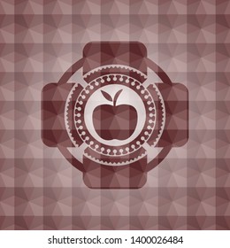 apple icon inside red seamless emblem with geometric background.