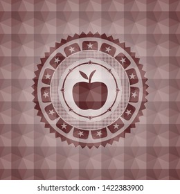 apple icon inside red seamless emblem with geometric background.