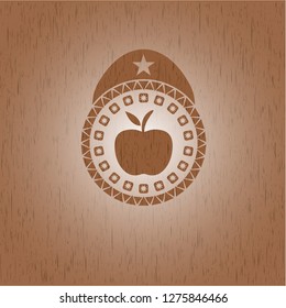 apple icon inside retro style wood emblem