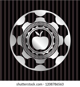 apple icon inside silver emblem