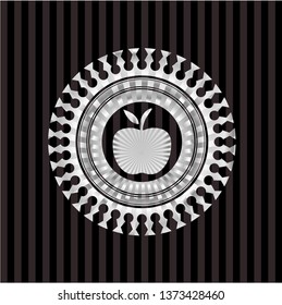 apple icon inside silvery emblem or badge