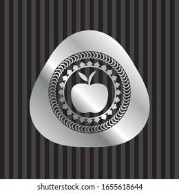 apple icon inside silvery emblem or badge