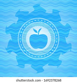 icono de manzana dentro del fondo del emblema de la ola azul cielo.