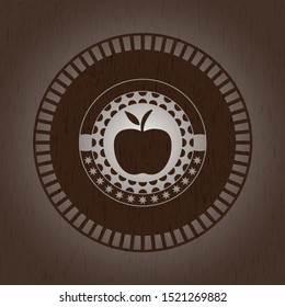 apple icon inside wooden emblem. Vintage.