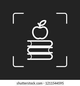 Apple on books icon. Knowledge logo. White object in camera autofocus on dark background