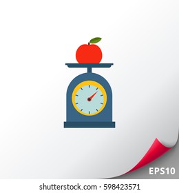 Apple on scales cup