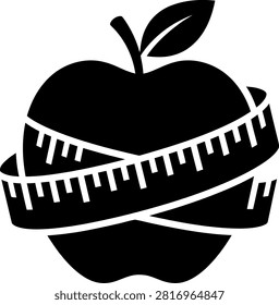 Apple wrapped in measuring tape for diet and fitness