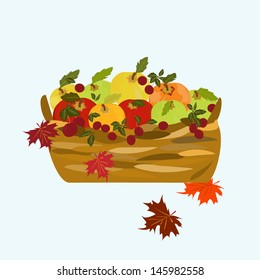 apples in the basket of autumn leaves