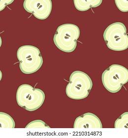 Apples pattern on a dark background. Halves of green apples for textiles, fabrics, wallpapers, kitchen.

