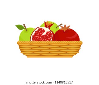 Apples and pomegranates in wicker basket, isolated on white background, design element for Harvest festival