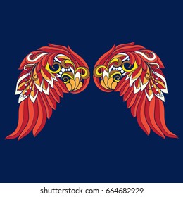 Application with red decorative ethnic patterned wing on blue jean
