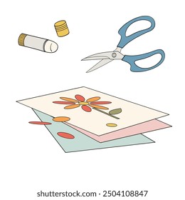 applique flower on sheet, scissors and glue