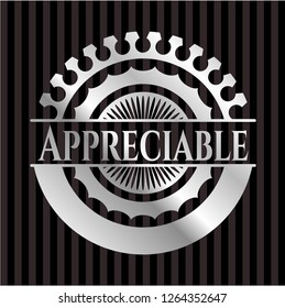 Appreciable silvery emblem