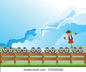 Apprehensive flock of birds perched on a fence deterred from feeding on farmers land by a scarecrow with cloudy blue sky above