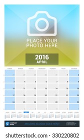 April 2016. Wall Monthly Calendar for 2016 Year. Vector Design Print Template with Place for Photo and Year Calendar. Week Starts Sunday