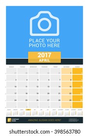 April 2017. Wall Monthly Calendar for 2017 Year. Vector Design Print Template with Place for Photo and Year Calendar. Week Starts Monday