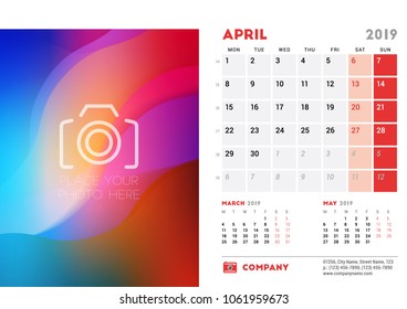 April 2019. Desk Calendar design template with place for photo. Week starts on Monday. Three months on page. Vector illustration