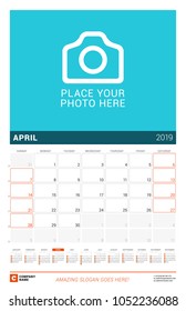 April 2019. Wall calendar for 2019 year. Vector design print template with place for photo and year calendar. Week sarts on Sunday