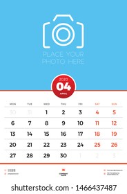 April 2020. Wall calendar planner template for 2020 year. Week starts on Monday. Vector illustration