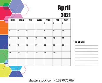 April 2021 Calendar, white background on the left, hexagons of various sizes and colors