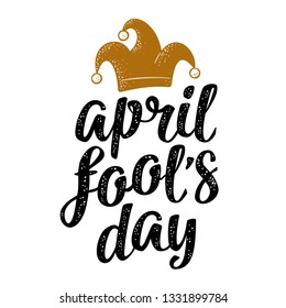 April fool's day calligraphic handwriting lettering with jester cap engraving. Vector color illustration isolated on white background. For web, poster