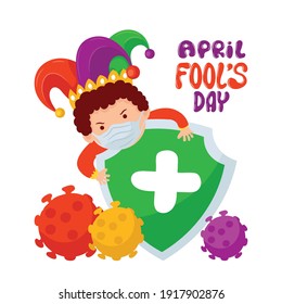 April Fools Day, Cute Kid clown wearing joker hat and holds a health shield