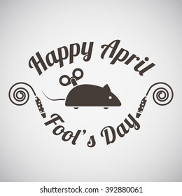April fool's day emblem with clockwork mouse. Vector illustration.