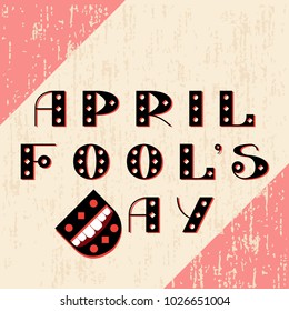 April Fools Day. The text is from beautiful letters. Laughing mouth from the letter D. On grunge background, pastel shades. For banners, postcards, signage, invitations, blog