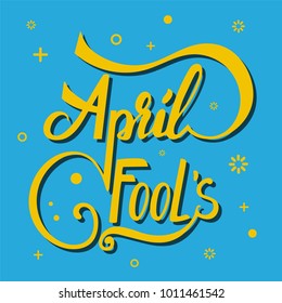 April Fool's hand lettering creative design. Yellow text on blue background