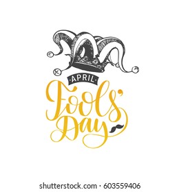 April Fools'day hand lettering greeting card. Vector festive calligraphy background with  jester hat illustration.