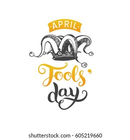 April Fools'day hand lettering greeting card. Vector festive calligraphy background with  jester hat illustration.