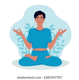 April is Stress Awareness Month. Woman with closed eyes meditating in yoga lotus posture. The girl is doing her favorite hobby