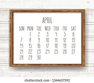 April year 2019 vector monthly calendar. Week starting from Sunday. Hand drawn text in a wooden frame over light brown rustic distressed wood background.