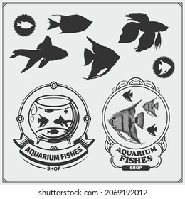 Aquarium fish emblem and icons set. Black and white silhouettes.