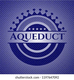 Aqueduct badge with jean texture