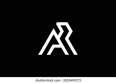 AR letter logo design on luxury background. RA monogram initials letter logo concept. AR icon design. RA elegant and Professional white color letter icon design on black background.