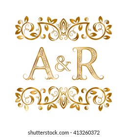 A&R vintage initials logo symbol. Letters A, R, ampersand surrounded floral ornament. Wedding or business partners initials monogram in royal style.