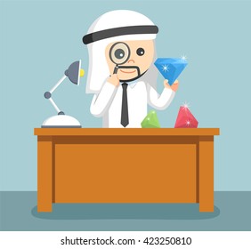 arab businessman checking quality of his diamonds