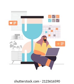 arab businessman using laptop overworked business man working with hourglass deadline time management