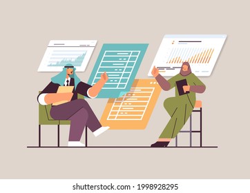 arab businesspeople analyzing financial data on charts and graphs planning report market analysis accounting