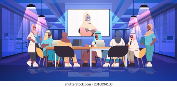 arab businesspeople having online conference business people discussing with businesswoman during video call