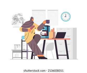 arab businesswoman drinking coffee in office coffee break concept horizontal