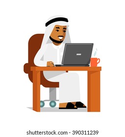 Arab man in computer internet working concept. Young saudi arabic man sitting at the computer desk with laptop and working