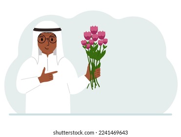 A arab man is holding a large bouquet of flowers. The concept of a holiday, congratulations, romance or gift.