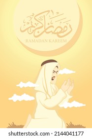 Hombre árabe rezando en ramadán con caligrafía. Traducción: ramadan kareem 
