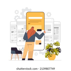 arab man technician working on smartphone repairing mobile application setting option adjusting concept