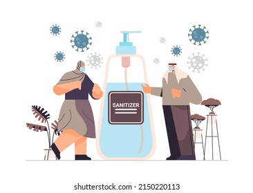 arab people in masks applying antibacterial spray disinfection against virus bacteria stop coronavirus use hand sanitizer