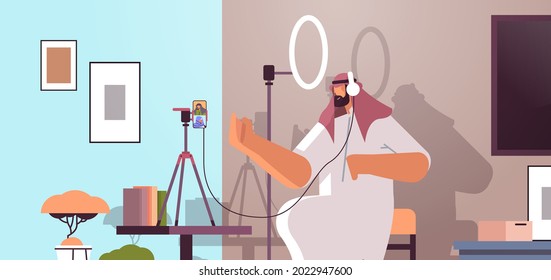 arab podcaster talking to microphone recording video blog in studio podcasting online radio broadcasting live streaming