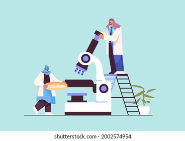 arab research scientist team working with microscope researchers making chemical experiment in laboratory